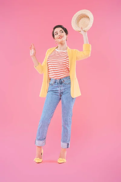 Cheerful Mixed Race Woman Waving Straw Hat Looking Away Pink — Stock Photo, Image