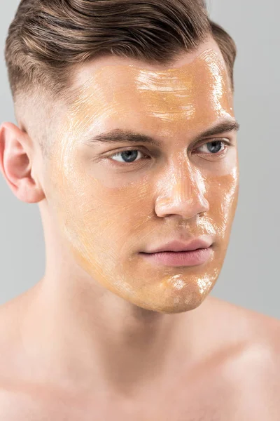 Pensive Young Man Facial Mask Looking Away Isolated Grey — Stock Photo, Image