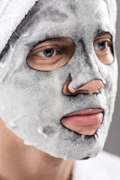Portrait Man Towel Head Foamy Facial Mask Looking Away — Stock Photo, Image