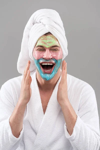 Front View Laughing Man Bathrobe Facial Mask Isolated Grey — 스톡 사진