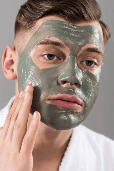 Sad Young Man Touching Clay Mask Isolated Grey — Stock Photo, Image
