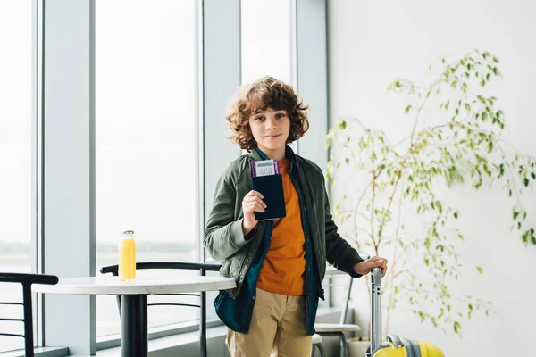 Boy Standing Yellow Suitcase Holding Passport Ticket Airport — Stock Photo, Image