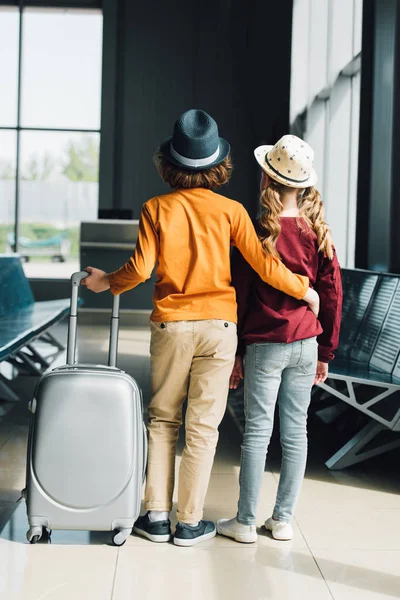 Back View Preteen Boy Suitcase Hugging Preteen Kid Waiting Hall — Stock Photo, Image