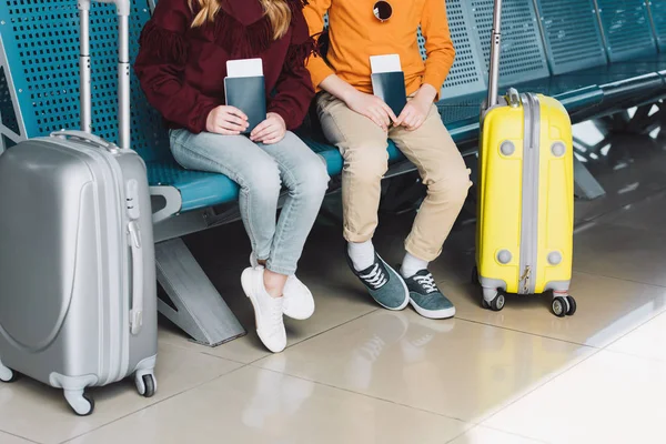 Cropped View Preteen Kids Sitting Waiting Hall Passports Suitcases — Stock Photo, Image