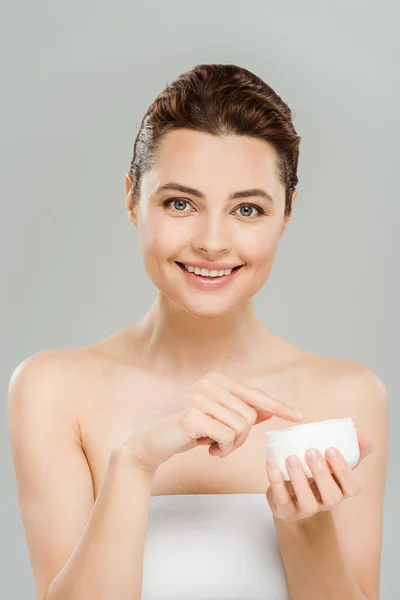 Happy Woman Smiling While Holding Container Face Cream Isolated Grey — Stock Photo, Image
