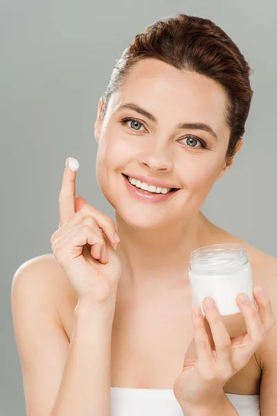 Smiling Woman Holding Container Face Cream Looking Camera Isolated Grey — Stock Photo, Image