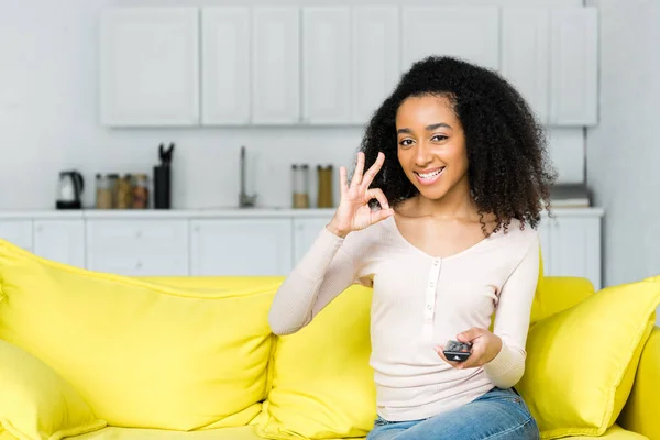 Happy African American Woman Remote Controller Showing Sign — Stock Photo, Image