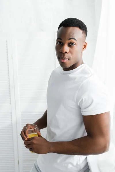 African American Man Holding Glass Orange Juice Hands — Stock Photo, Image