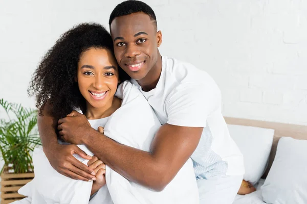 African American Couple Cuddling Each Other Looking Camera — Stock Photo, Image