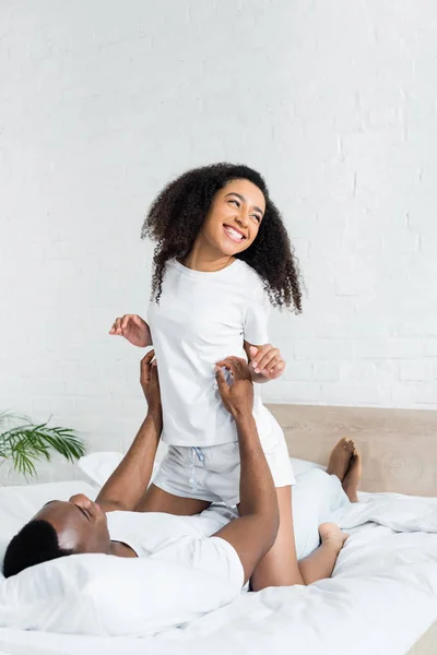 Happy African American Couple Spending Time Together Lying Bed Home — Stock Photo, Image