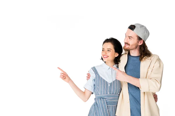 Young Couple Pointing Fingers Hugging Looking Away Isolated White — Stock Photo, Image