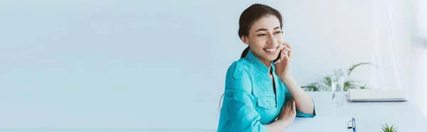 Panoramic Shot Cheerful Doctor Smiling While Talking Smartphone — Stock Photo, Image