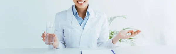Panoramic Shot Smiling Doctor Handful Pills Glass Water — Stock Photo, Image