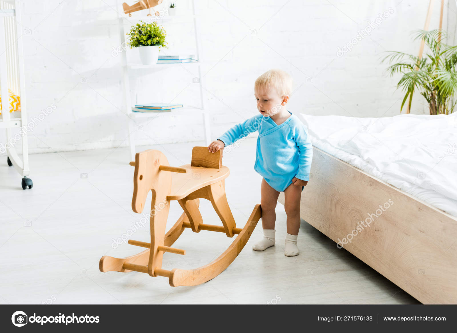 Cute Toddler Boy Standing Wooden Rocking Horse Modern
