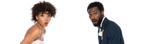 панорамный снимок удивленной африканской невесты и жениха изолировать на белом
 