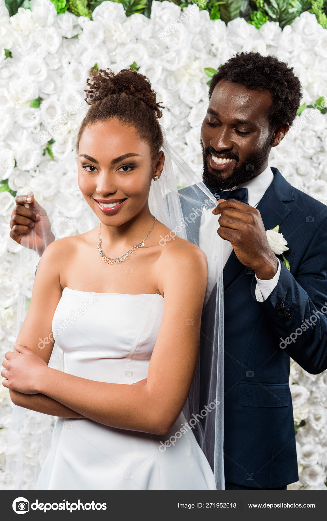 https://st4.depositphotos.com/12982378/27195/i/1600/depositphotos_271952618-stock-photo-cheerful-african-american-bridegroom-touching.jpg