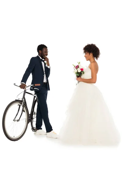 African American Bridegroom Standing Bicycle Looking Cheerful Bride Flowers Isolated — Stock Photo, Image