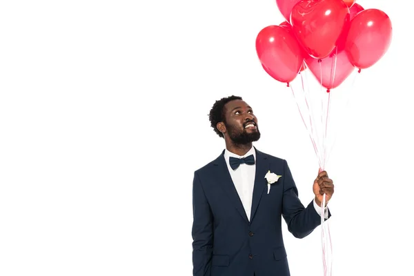 Handsome African American Bridegroom Holding Pink Heart Shaped Balloons Isolated — Stock Photo, Image