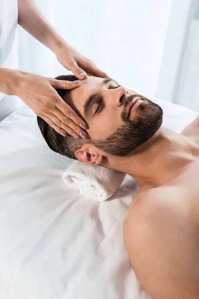 Cropped View Masseur Doing Massage Handsome Man Closed Eyes — Stock Photo, Image