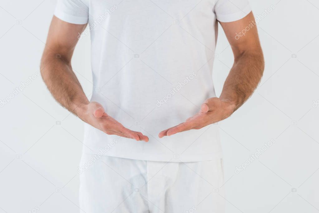 cropped view of man standing and gesturing isolated on white 