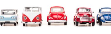 panoramic shot of colorful toy cars and bus on white clipart