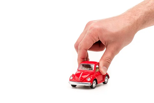 Vista Cortada Homem Segurando Carro Brinquedo Vermelho Branco — Fotografia de Stock