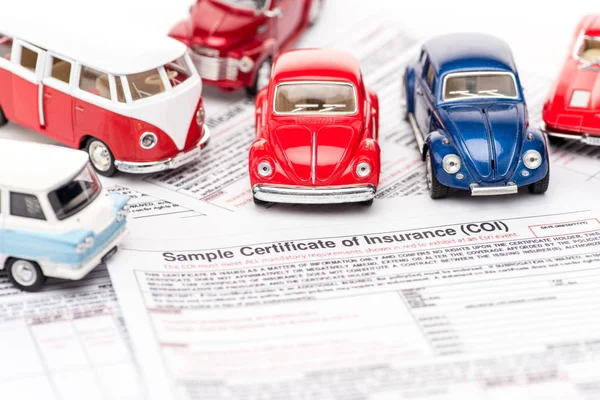 Selective Focus Colorful Toy Cars Insurance Documents — Stock Photo, Image