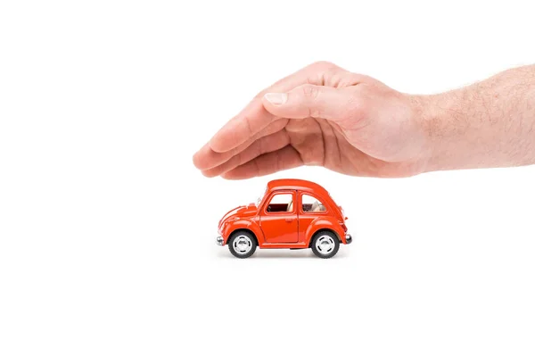 Vista Cortada Homem Com Carro Brinquedo Vermelho Branco — Fotografia de Stock