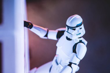 white and plastic Imperial Stormtrooper toy climbing wall