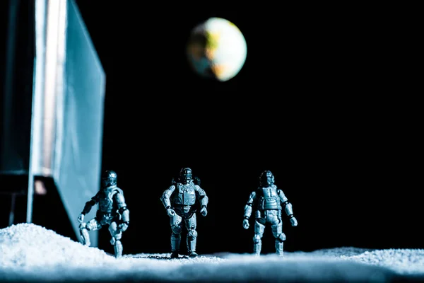 Toy Soldiers Standing Space Black Background Planet Earth — Stock Photo, Image