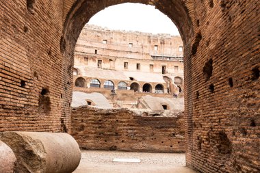 ROME, ITALY - JUNE 28, 2019: tourists at ancient building with bricked walls clipart