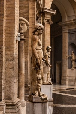 ROME, ITALY - JUNE 28, 2019: ancient roman statues in museum clipart