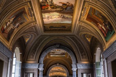 ROME, ITALY - JUNE 28, 2019: ceiling with ancient frescoes in vatican museum  clipart