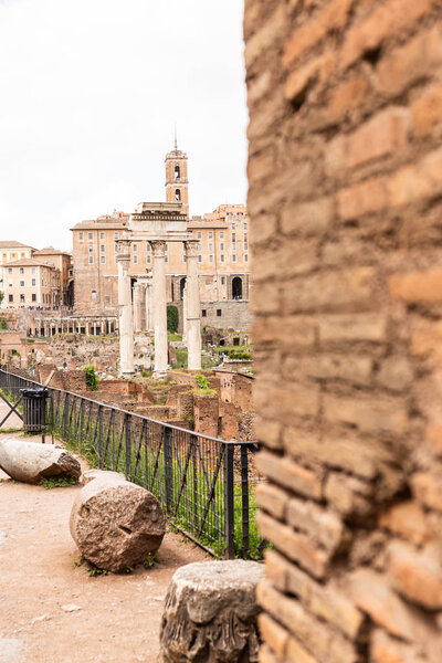 ROME, ITALY - JUNE 28, 2019: selective focus of ancient ruined buildings