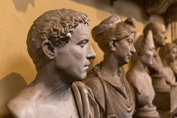 ROME, ITALY - JUNE 28, 2019: selective focus of ancient busts in vatican museum