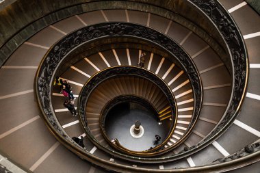 ROME, ITALY - JUNE 28, 2019: overhead view of people on Bramante Staircase in vatican museums clipart