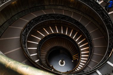 ROME, ITALY - JUNE 28, 2019: old spiraling Bramante Staircase in vatican museums clipart