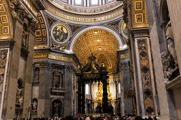 ROME, ITALY - JUNE 28, 2019: cropped view of crowd of tourists in vatican museum