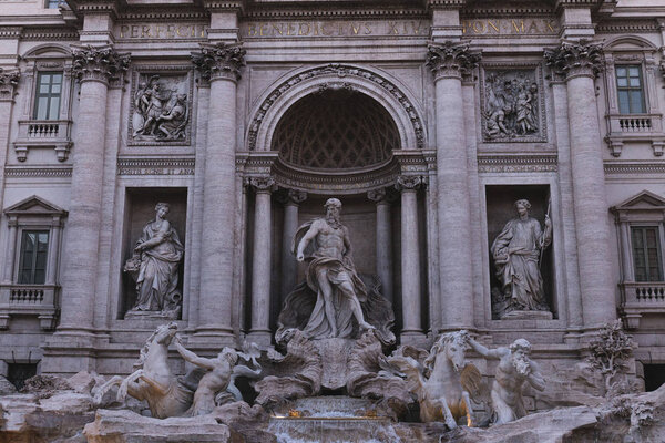 ROME, ITALY - JUNE 28, 2019: old building with ancient roman sculptures