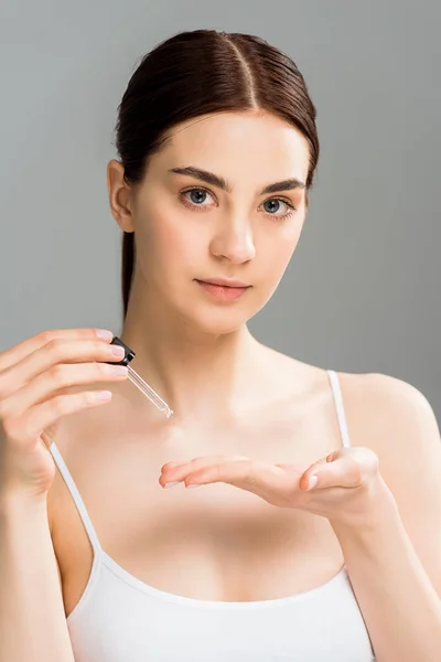 Attractive Brunette Girl Holding Pipette Looking Camera Isolated Grey — Stock Photo, Image