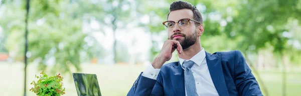 Panoramic Shot Youg Businessman Looking Away While Sitting Table Park — Stock Photo, Image
