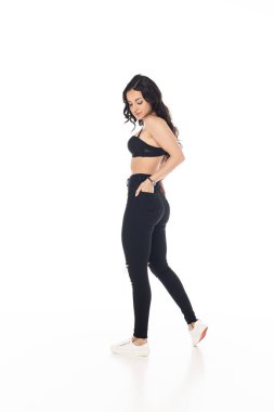 siyah sütyen ve pantolon seksi kız tam uzunlukta görünümü cebinde el ile beyaz izole