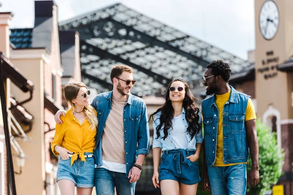 Cheerful Women Hands Pockets Walking Multicultural Men — Stock Photo, Image