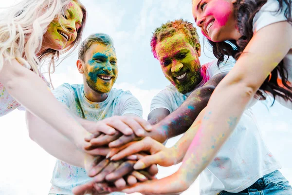 Low Angle View Multicultural Friends Holi Paints Faces Putting Hands — Stock Photo, Image