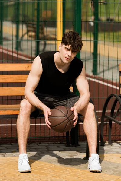 Serious Basketball Player Ball Sitting Wooden Bench Sunny Day Basketball — Stock Photo, Image