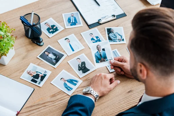 Selective Focus Recruiter Holding Photo African American Man Wooden Table — Stock Photo, Image