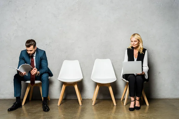 Attractive Blonde Woman Using Laptop While Waiting Job Interview Man — Stock Photo, Image