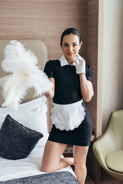 Smiling Maid White Glove Holding Duster Bed Looking Camera — Stock Photo, Image