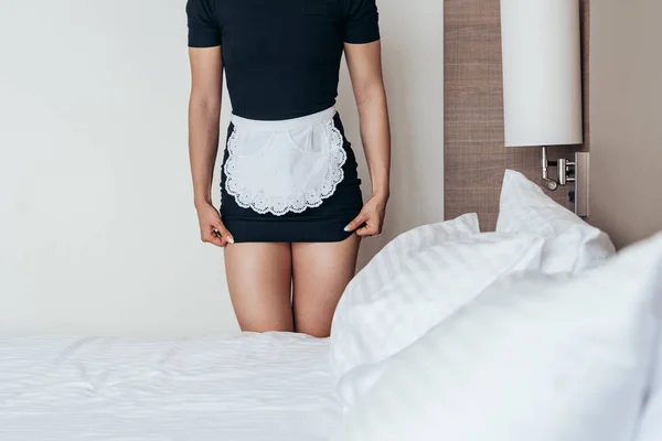 Cropped View Maid White Apron Standing Bed Hotel Room — Stock Photo, Image