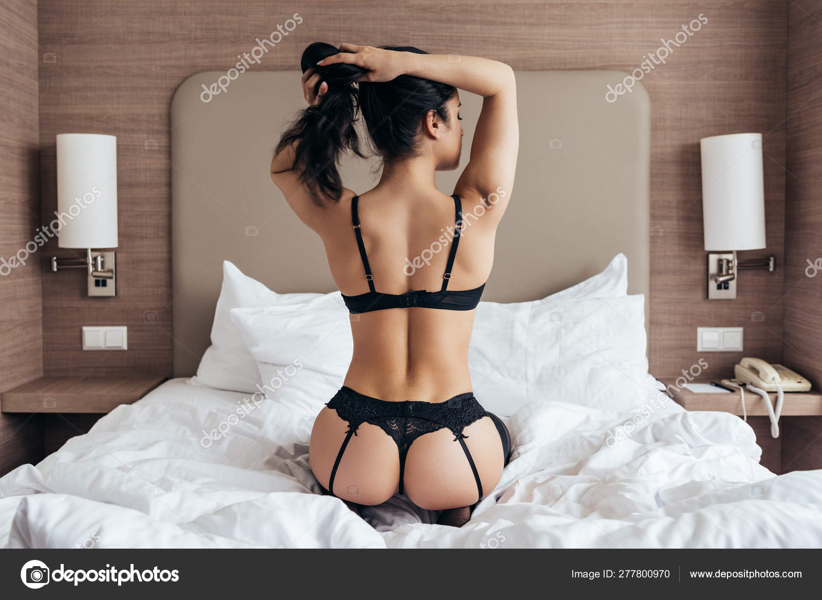 Back View Sexy Brunette Young Woman Black Lingerie Sitting Bed Stock Photo by ©IgorVetushko 277800970